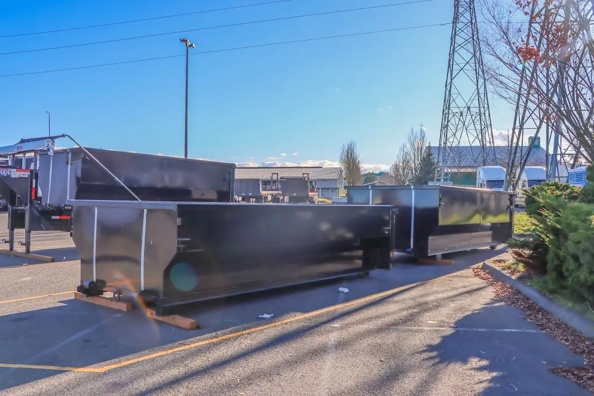 Roll-off dumpster ready for waste disposal at job site for 2 Yard Dumpster Rental in Janesville